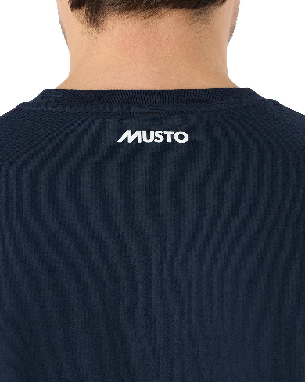 Navy Coloured Musto Mens 1964 Short Sleeve T-Shirt On A White Background 