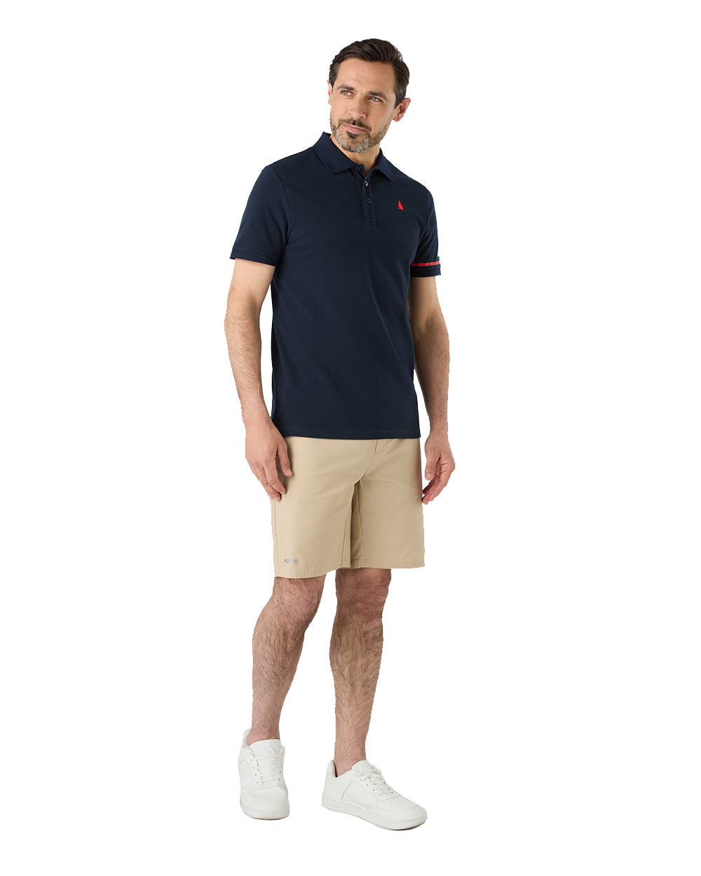 Navy Coloured Musto Mens Red Yacht Short Sleeve Polo Shirt On A White Background 