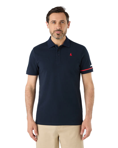 Navy Coloured Musto Mens Red Yacht Short Sleeve Polo Shirt On A White Background 