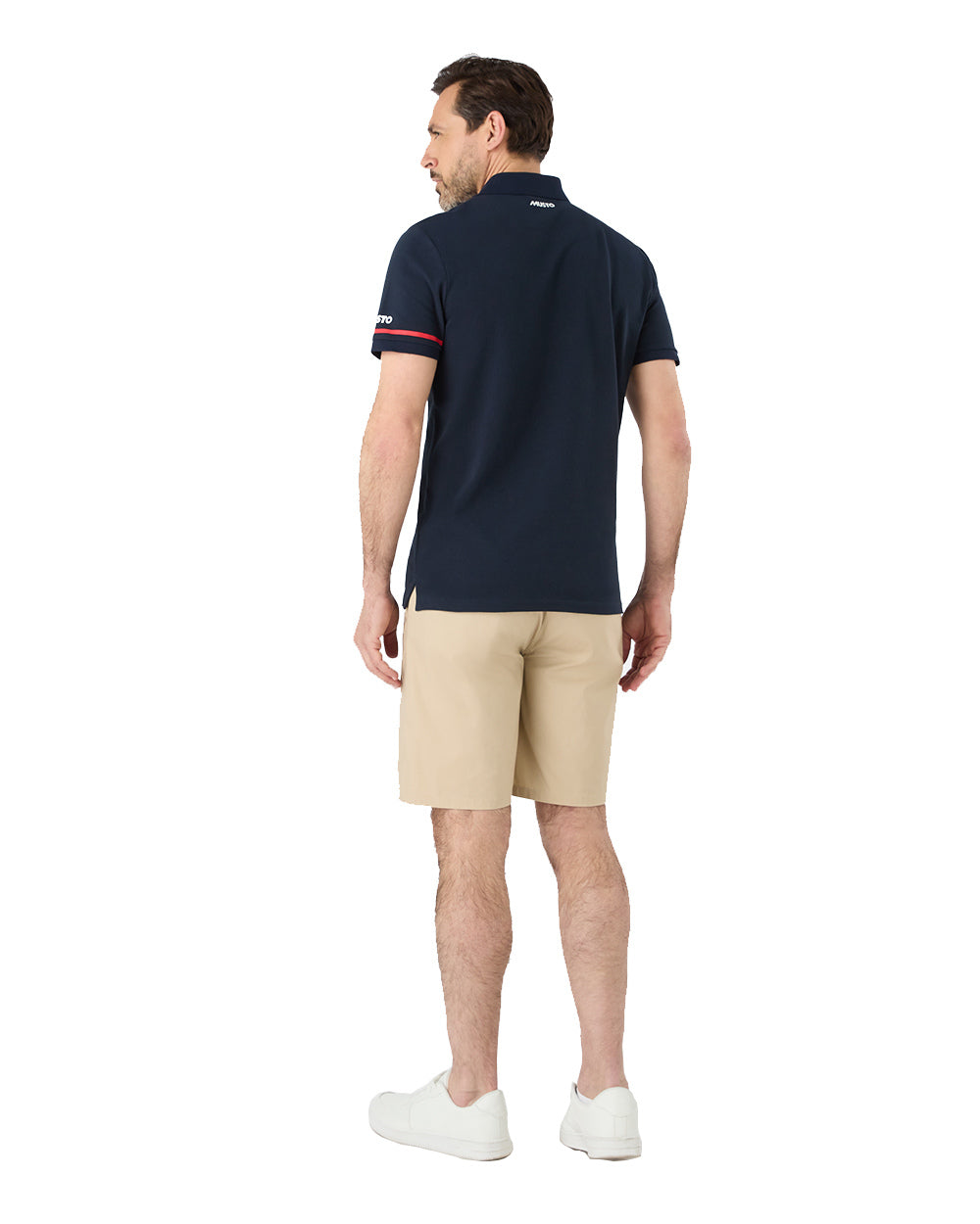 Navy Coloured Musto Mens Red Yacht Short Sleeve Polo Shirt On A White Background 