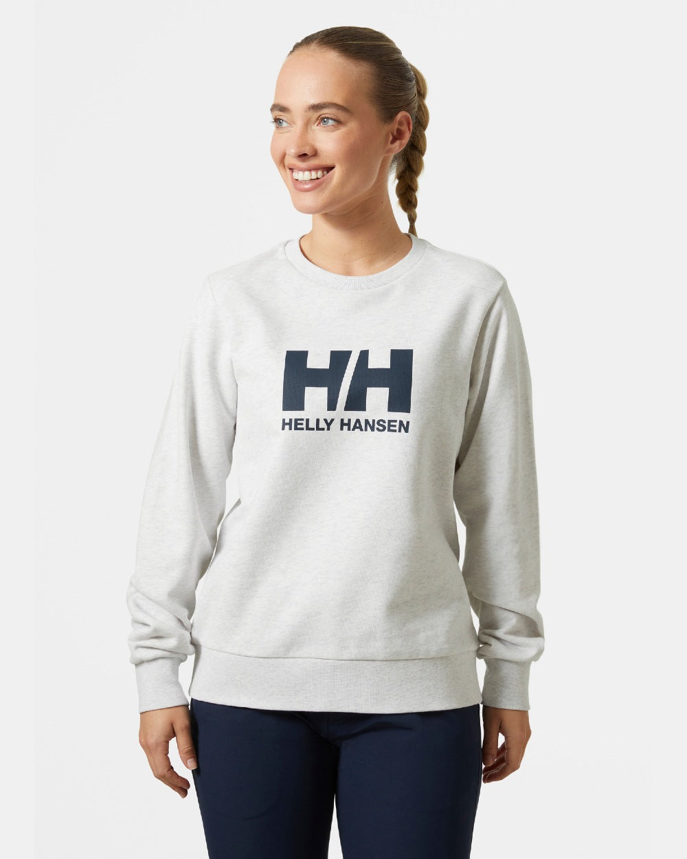 Nimbus Cloud Melange coloured Helly Hansen Womens Logo Crew Sheatshirt 2.0 on a grey background 