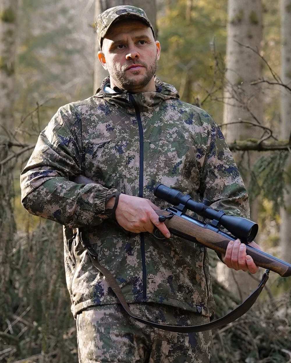 Camo coloured Northern Hunting Kjell Aske Tanatex Hunting Jacket on forest background 