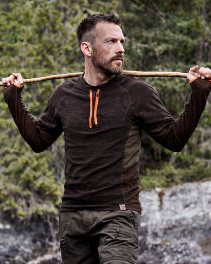 Brown coloured Northern Hunting Mens Bjorn Fleece Undershirt on forest background 
