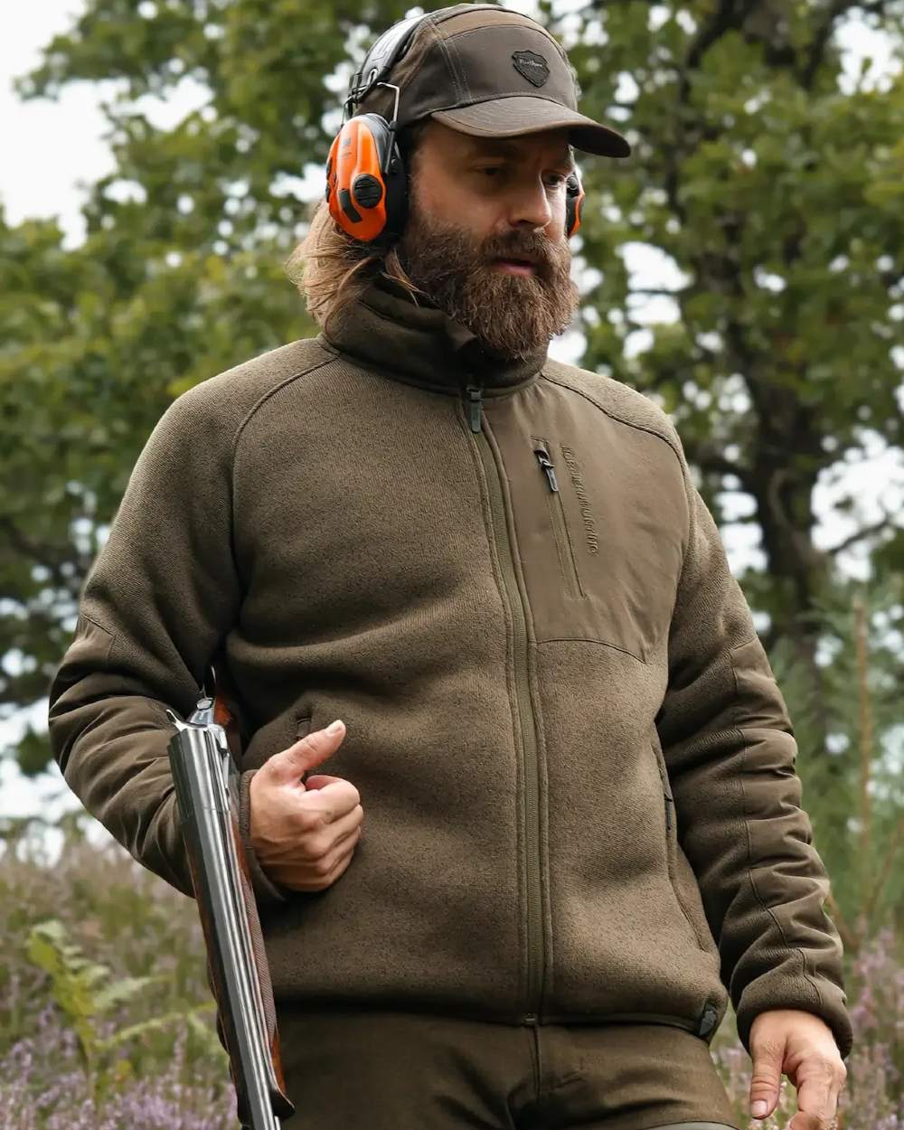 Green coloured Northern Hunting Mens Helge Fleece Jacket on forest background 