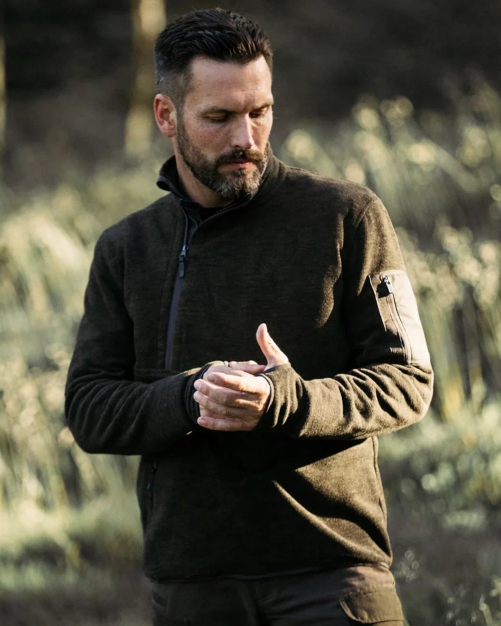 Brown coloured Northern Hunting Mens Thorlak Fleece Sweatshirt on forest background 