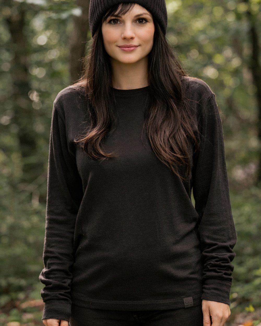Dark Green coloured Northern Hunting Norr Vik Long Sleeve Baselayer Top on forest background 