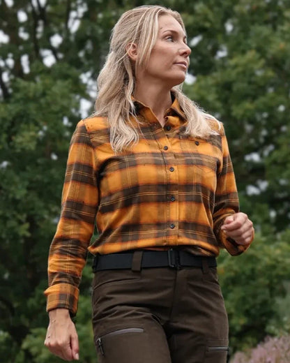 Buckthorn coloured Northern Hunting Womens Astrid Organic Cotton Shirt on forest background 