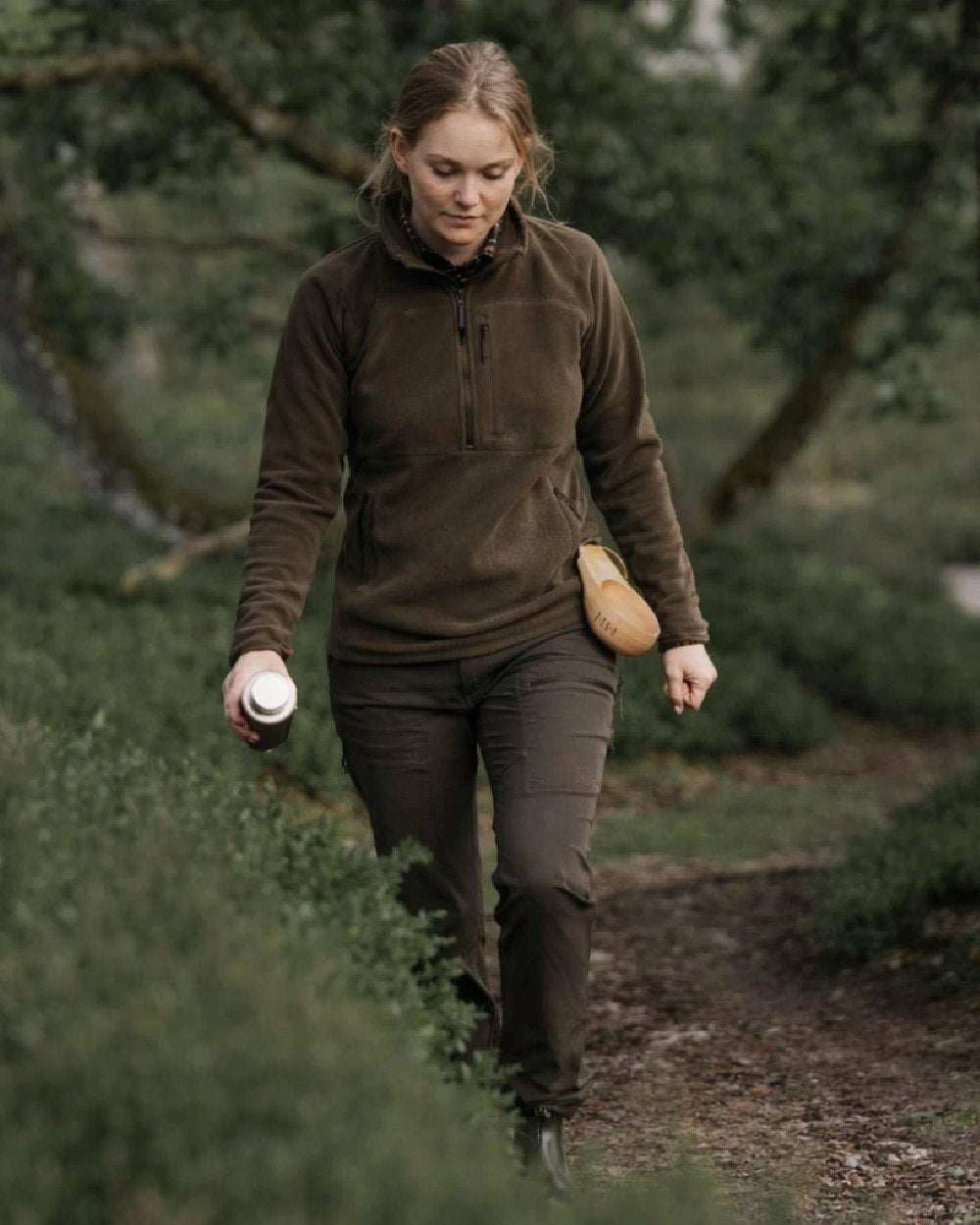 Green coloured Northern Hunting Womens Elga 2000 Fleece on forest background 