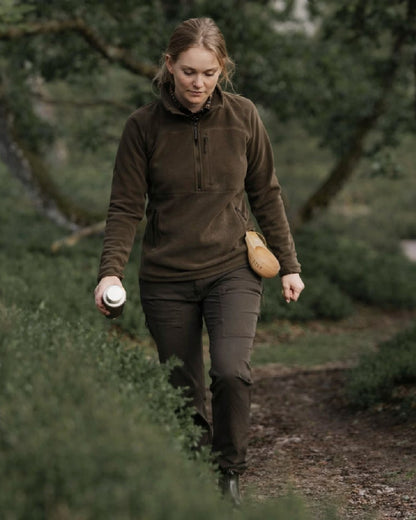 Green coloured Northern Hunting Womens Elga 2000 Fleece on forest background 