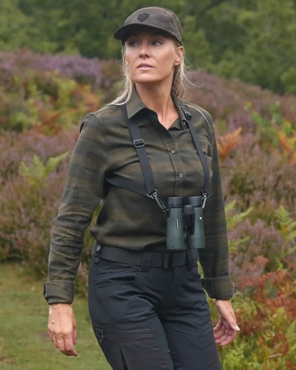 Green coloured Northern Hunting Womens Svala Organic Cotton Shirt on forest background 