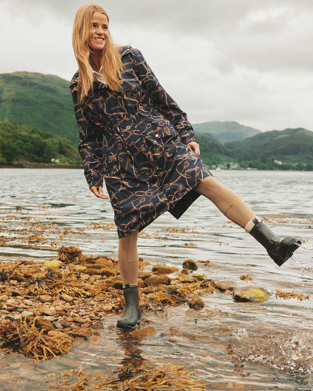 Chocolate Brown coloured Oakfield Womens Short Neoprene Lined Wellies on river background 