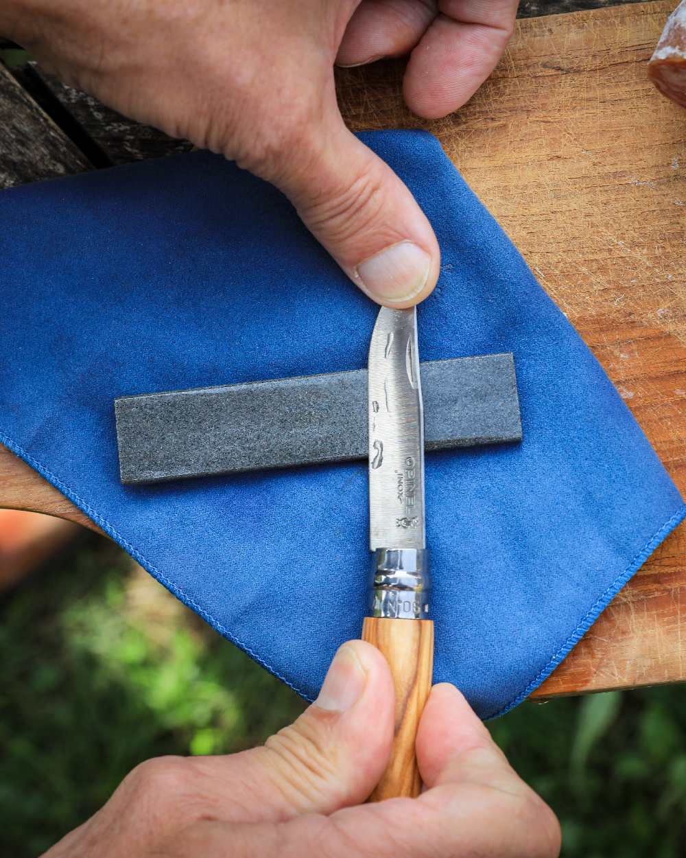10cm Opinel Sharpening Stone on forest background