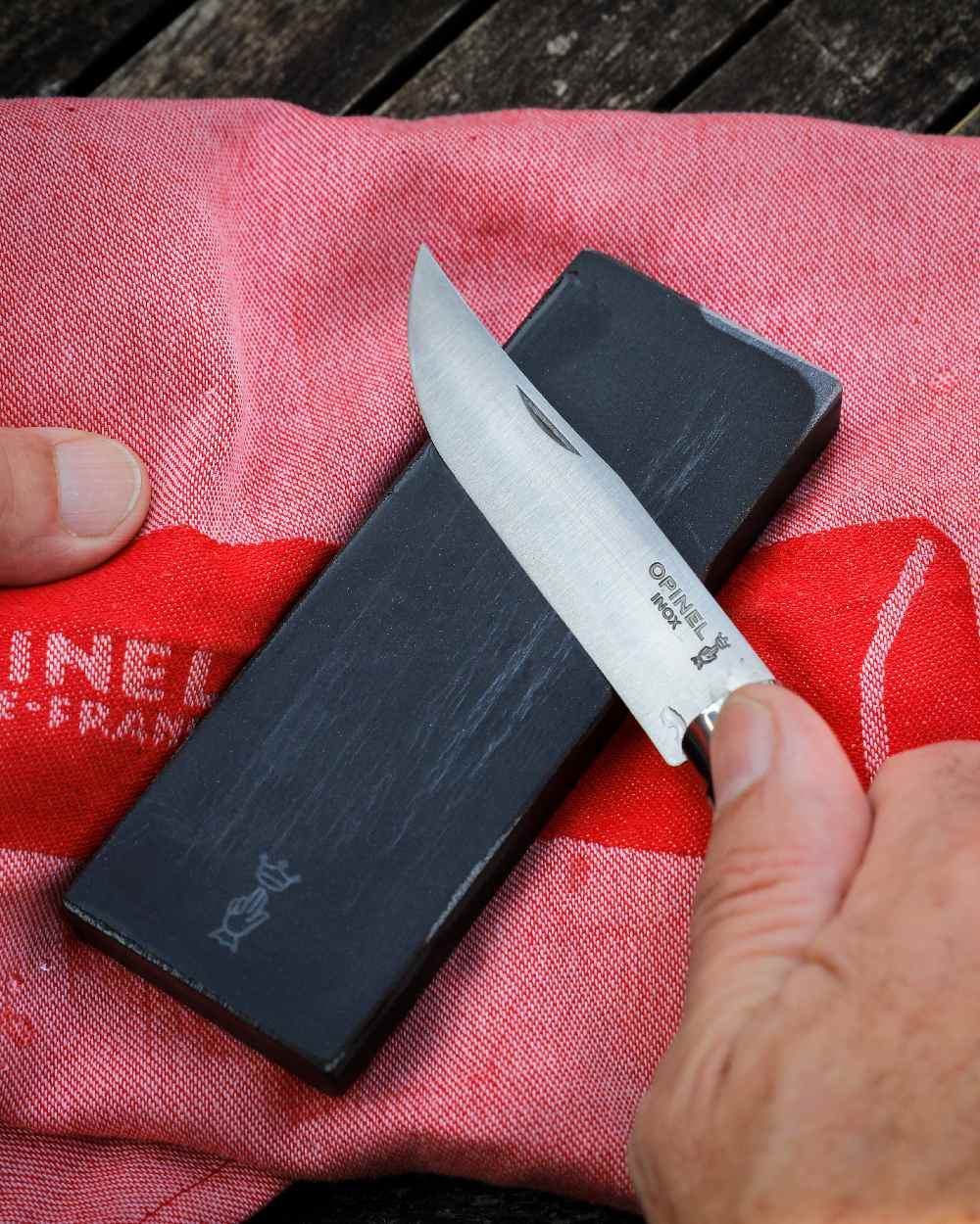 14cm Opinel Sharpening Stone on forest background