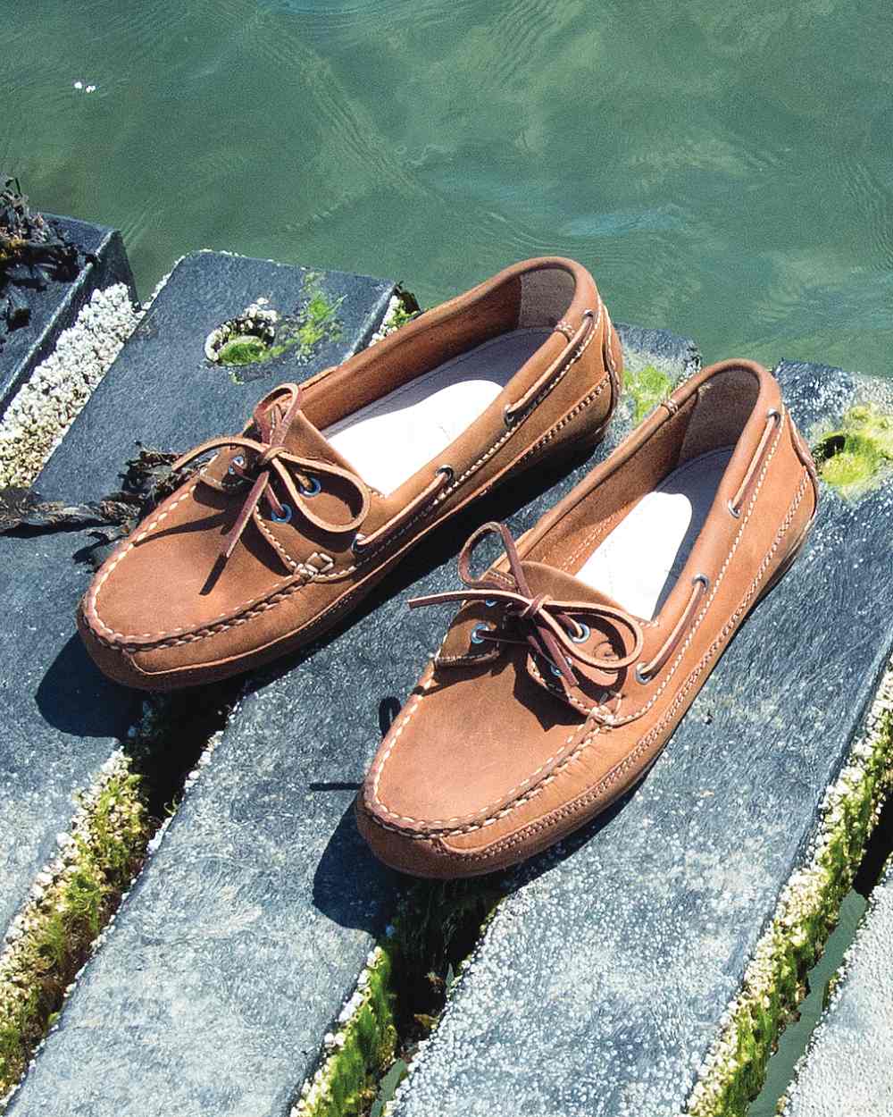 Sand Coloured Orca Bay Bahamas Womens Deck Shoes On A Lake Background 