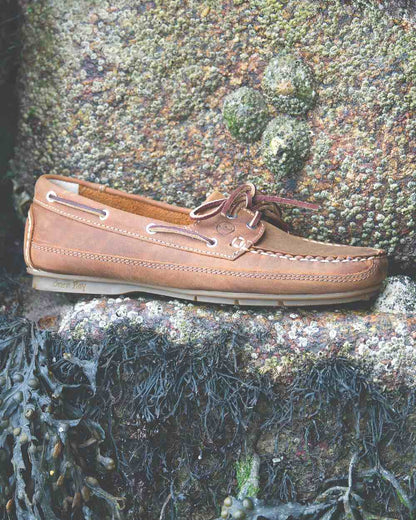 Sand Coloured Orca Bay Bahamas Womens Deck Shoes On A Stone Background 