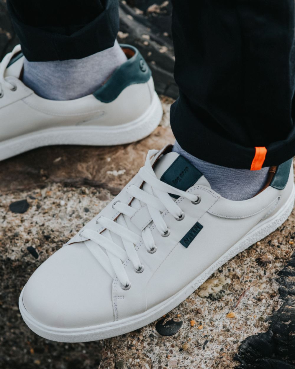 White Navy Coloured Orca Bay Mens Belgravia Trainers on outdoor background 