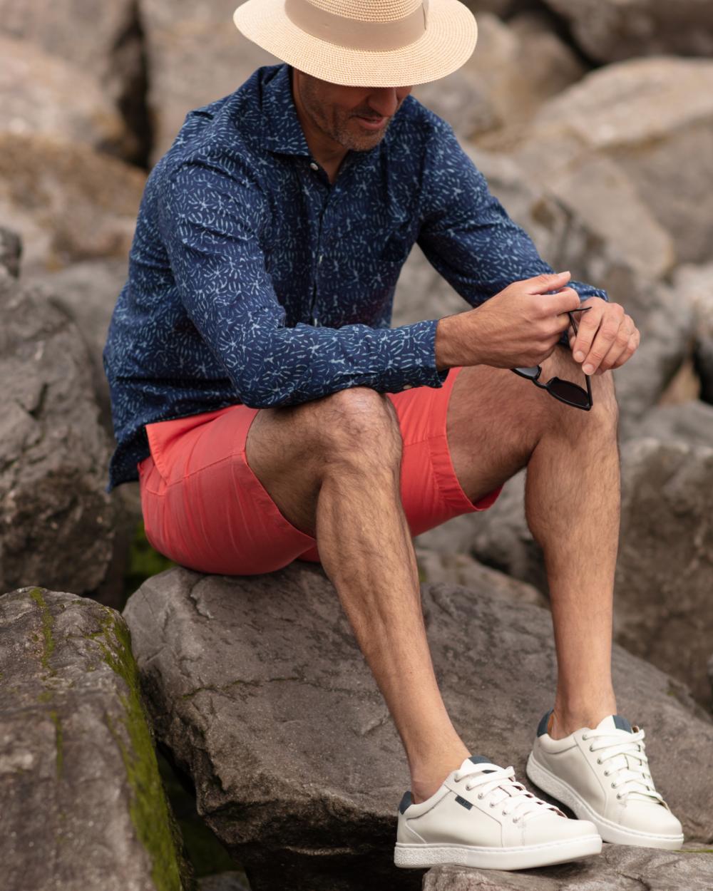 White Navy Coloured Orca Bay Mens Belgravia Trainers on rock background 