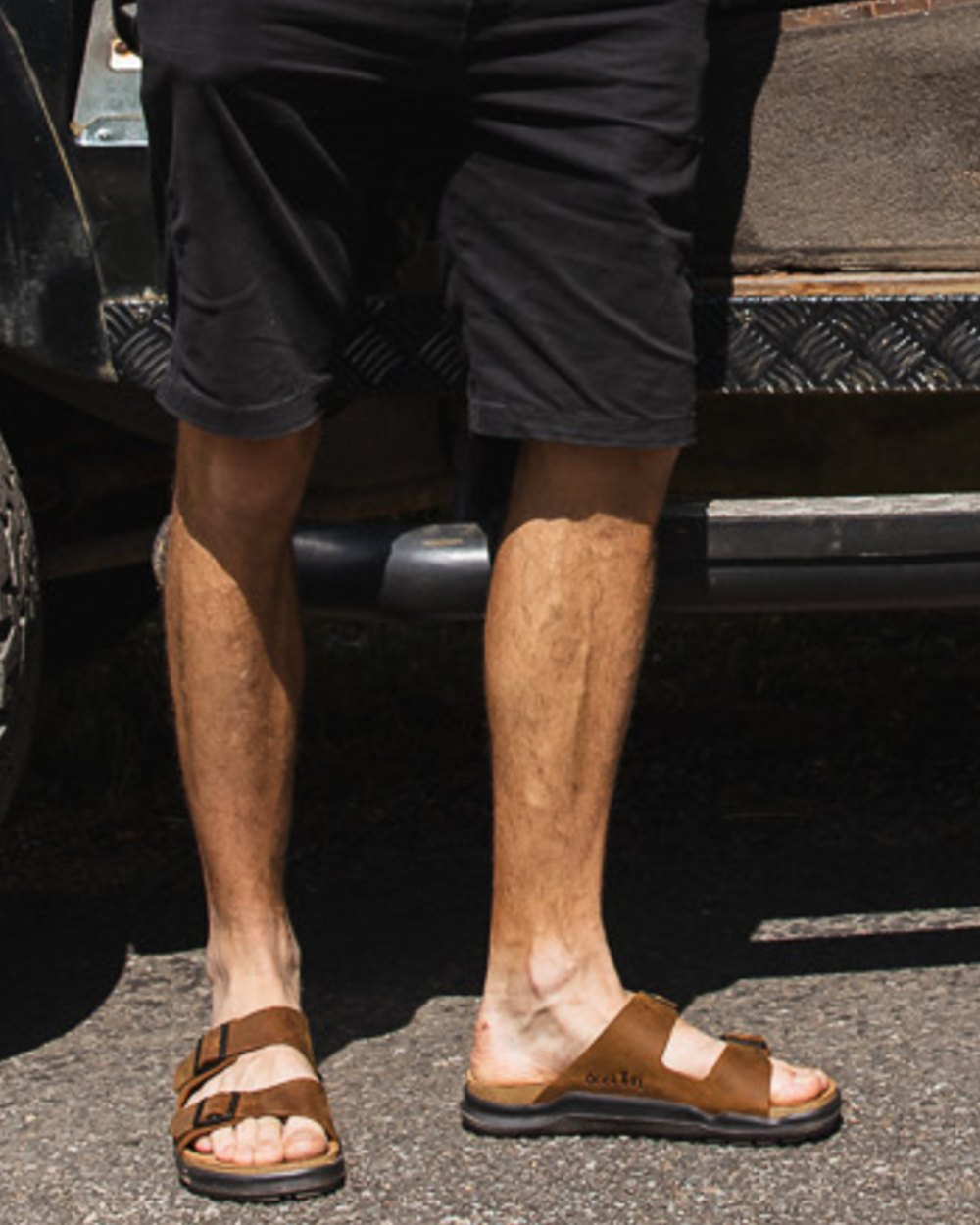 Sand coloured Orca Bay Mens Carbis Sandals on outdoor background 