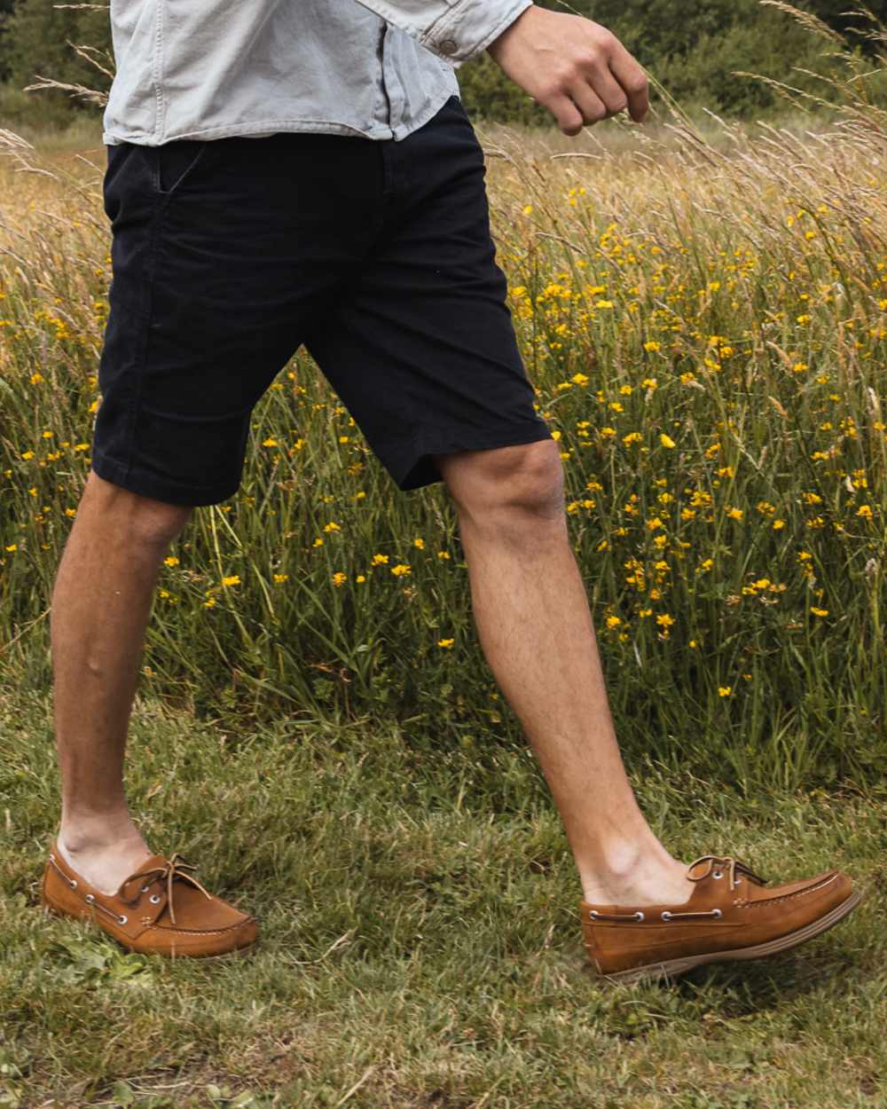 Sand Coloured Orca Bay Mens Fowey Wide Fit Deck Shoes on grassy background 