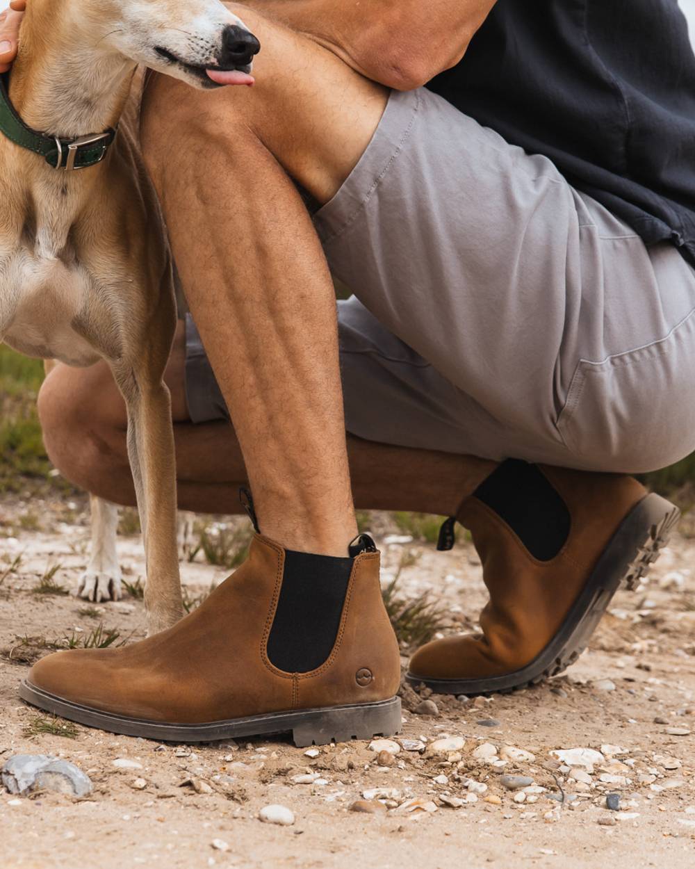 Sand coloured Orca Bay Mens Henley Shoes on sand background 