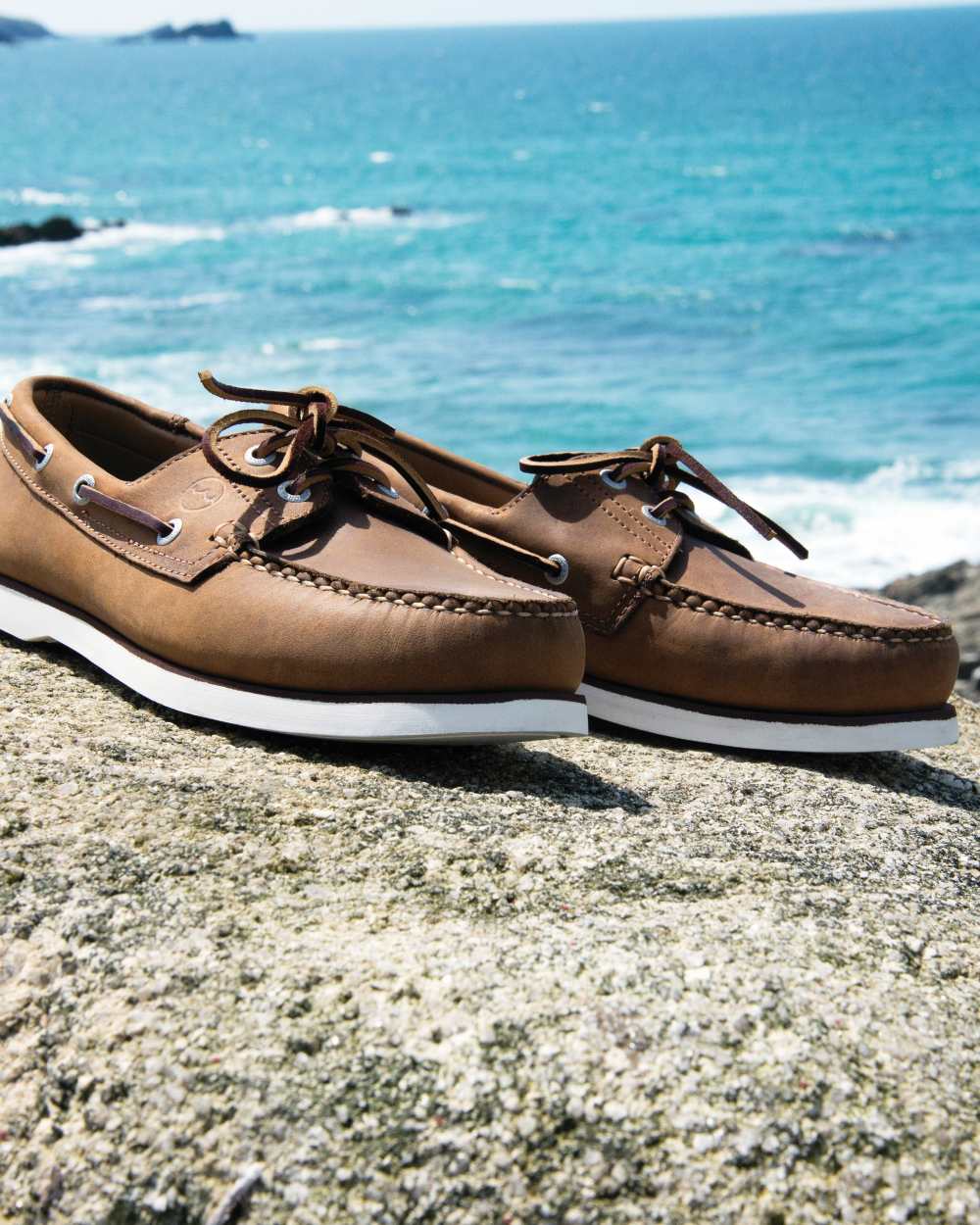 Russet Coloured Orca Bay Mens Portland Premium Ocean Gold Shoes on ocean background 