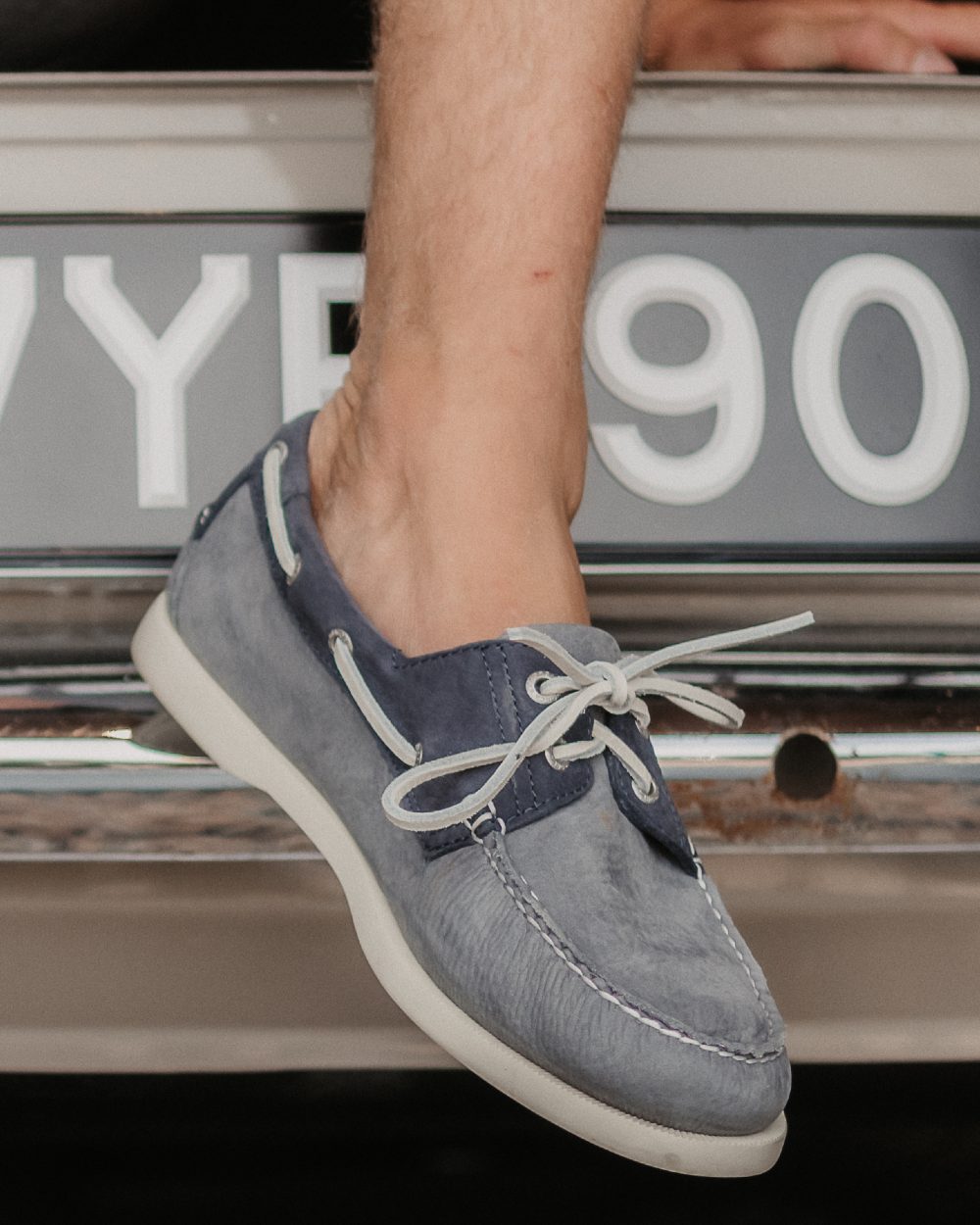 Grey Indigo Coloured Orca Bay Mens Sandusky Deck Shoes On A Car Background 