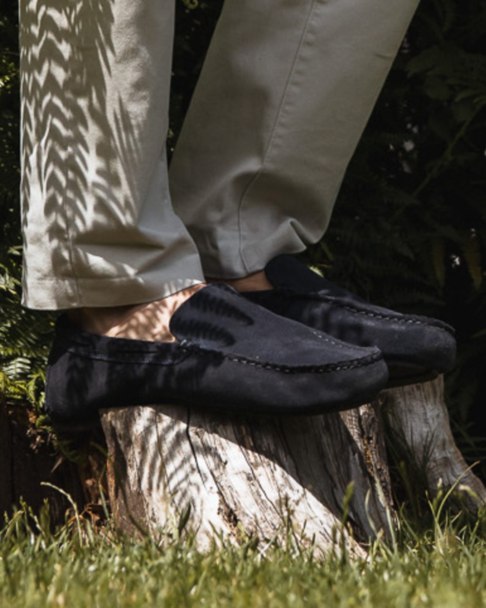 Navy Coloured Orca Bay Mens Silverstone Loafers on grassy background 