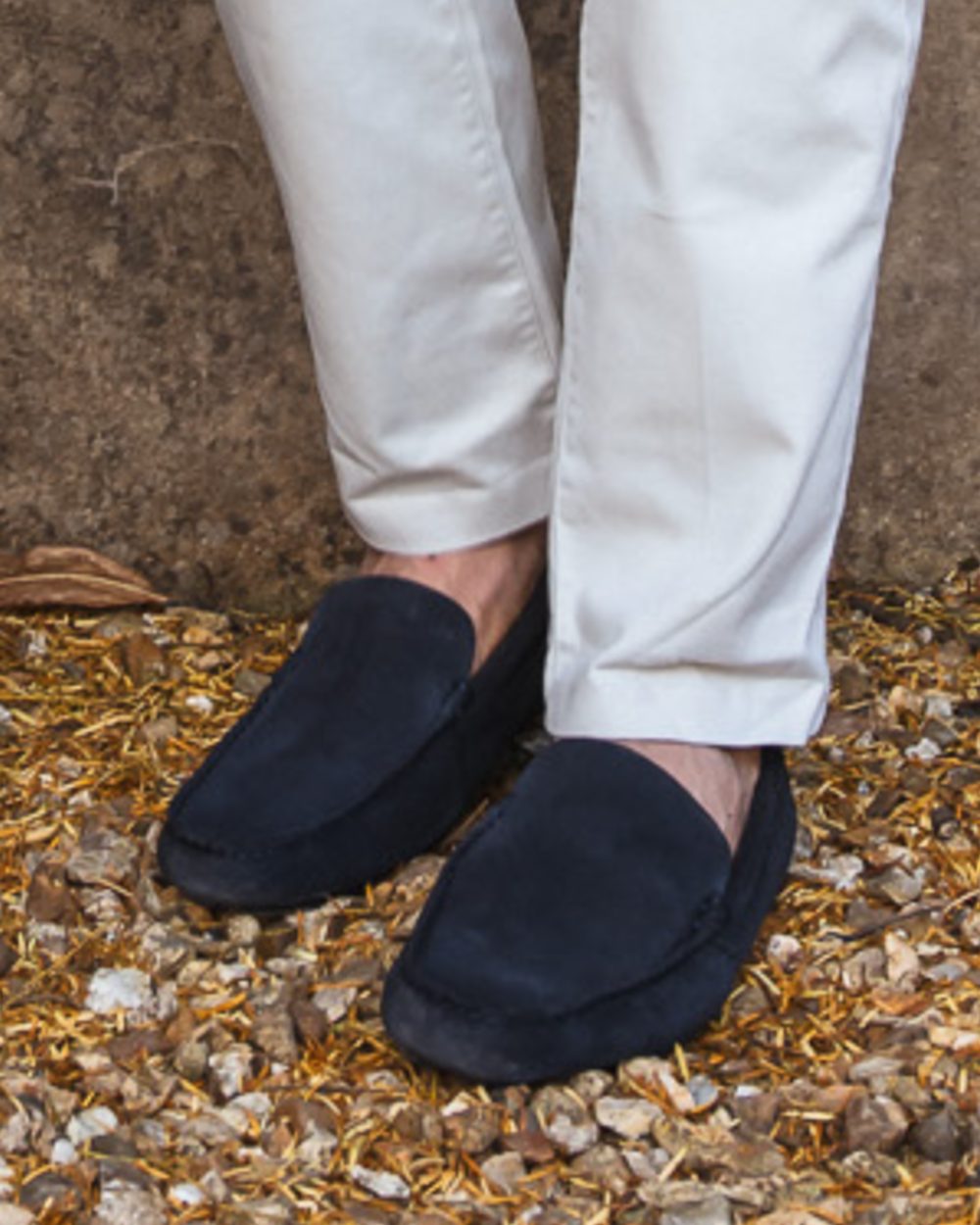 Navy Coloured Orca Bay Mens Silverstone Loafers on stone background 
