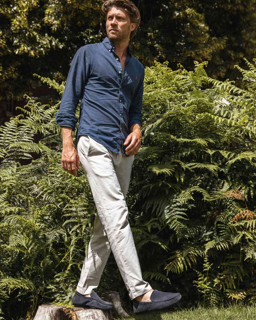 Navy Coloured Orca Bay Mens Silverstone Loafers on garden background 