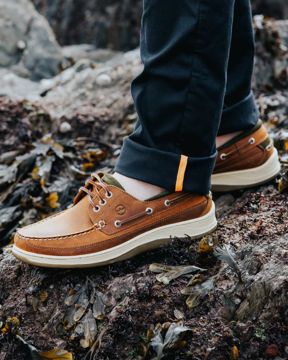 Sand Coloured Orca Bay Mens Squamish Shoes on stone background 