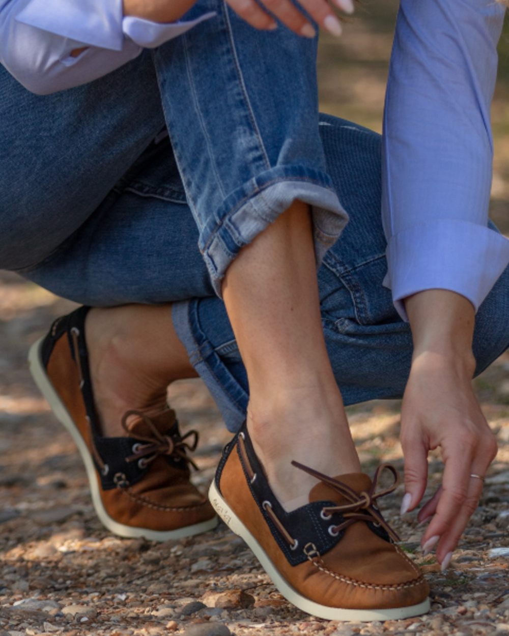 Sand Navy Coloured Orca Bay Womens Clovelly Deck Shoes on outdoor background 