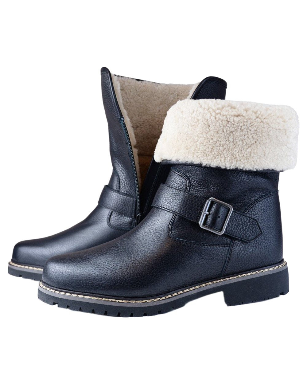 Black coloured Orca Bay Womens Coniston Real Sheepskin Lining Boots on white background 