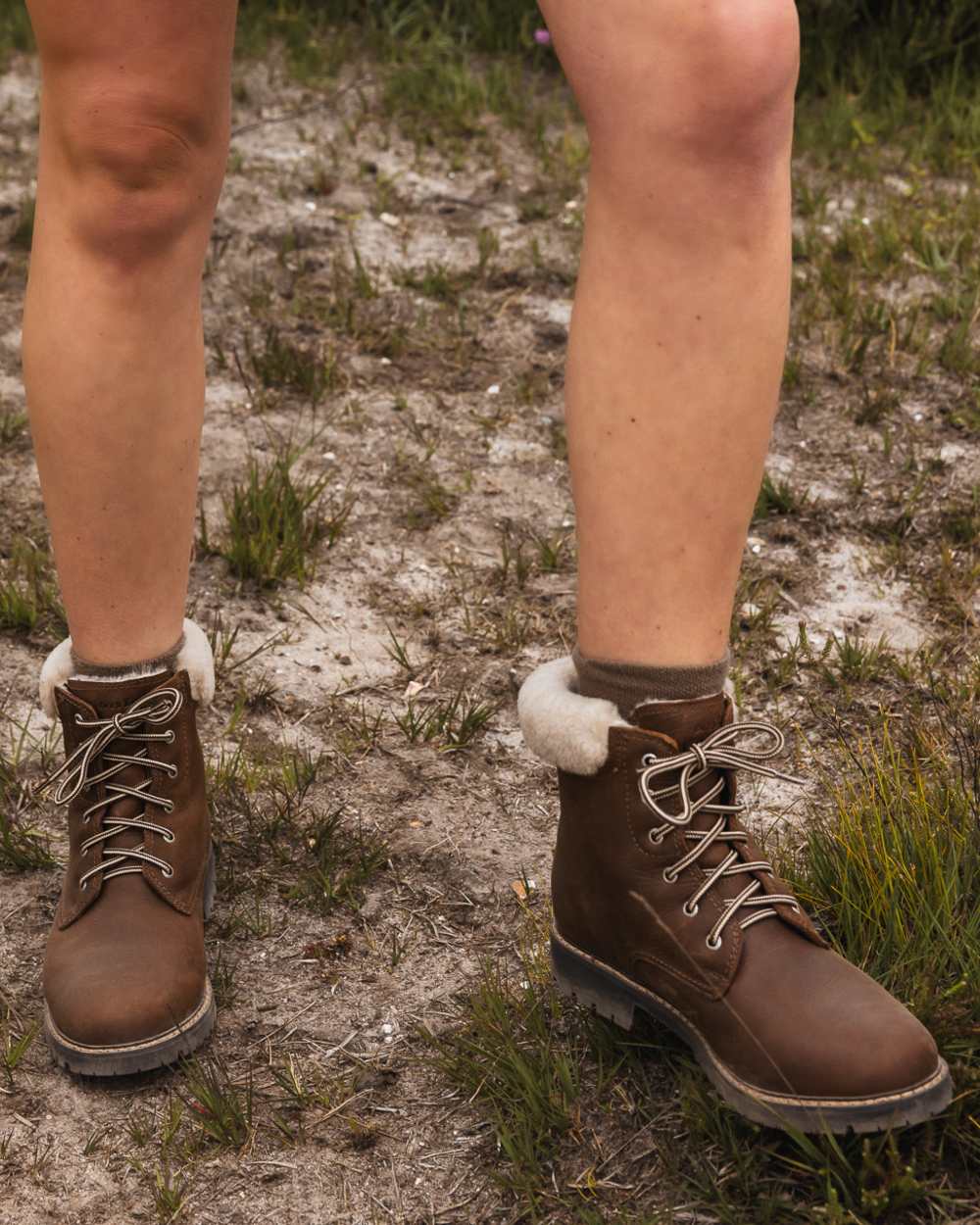 Brown coloured Orca Bay Womens Real Sheepskin Lining Pennine Boots on outdoor background 