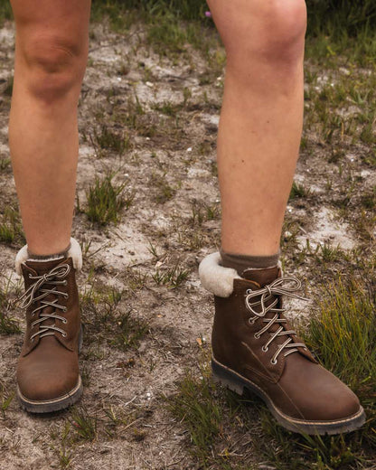 Brown coloured Orca Bay Womens Real Sheepskin Lining Pennine Boots on outdoor background 
