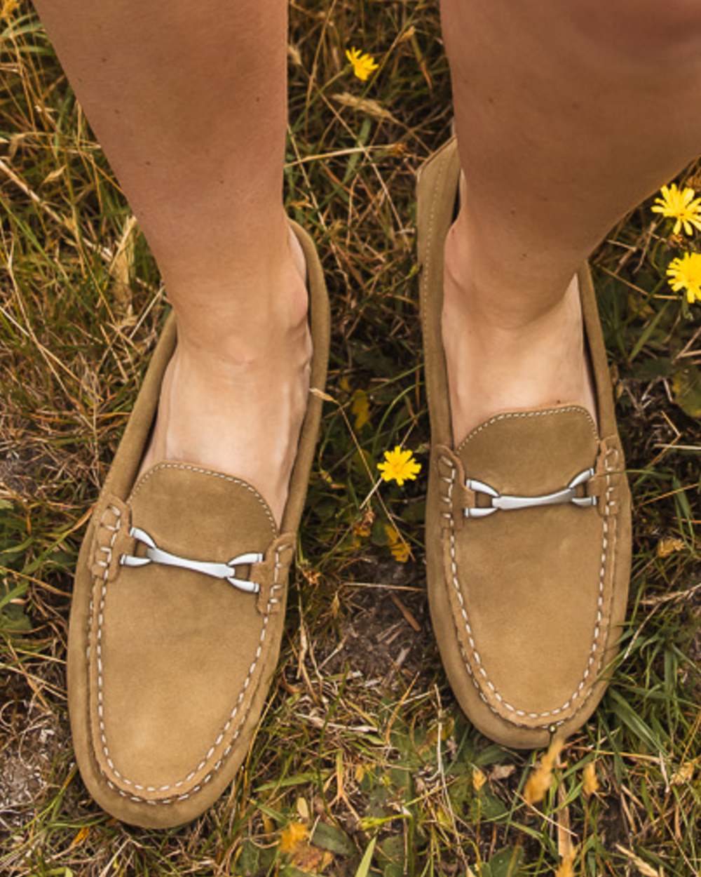 Taupe coloured Orca Bay Womens Sorrento Loafers on grassy background 