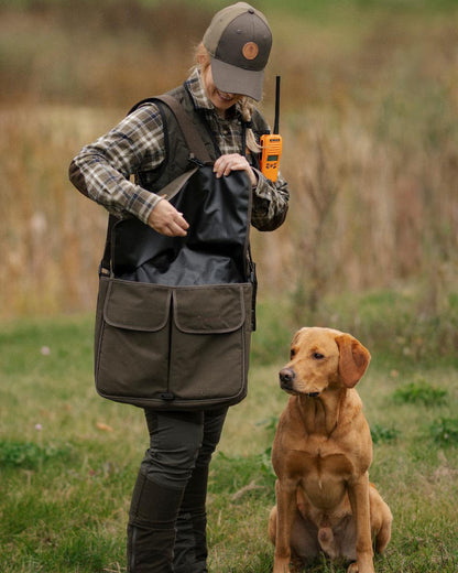 Moss Green Coloured Pinewood Dog Sports Shoulder Bag on outdoor background 