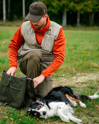 Moss Green Coloured Pinewood Dog Sports Shoulder Bag on outdoor background 
