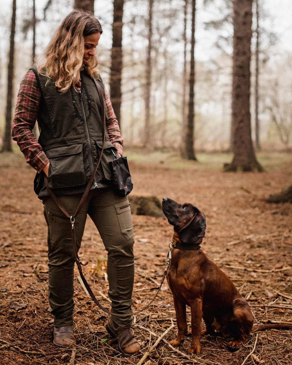Black Coloured Pinewood Dog Sports Treat Bag on outdoor background 