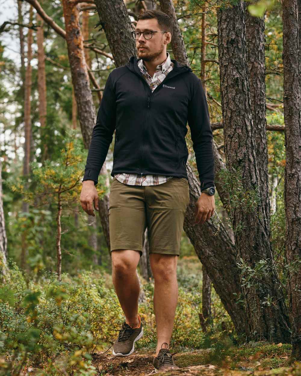 Black Coloured Pinewood Finnveden Hoodie on outdoor background 