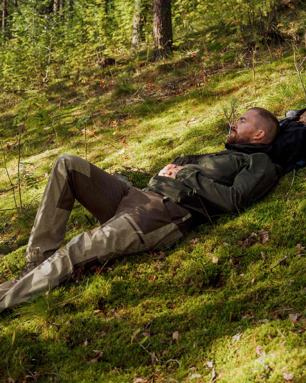 Moss Green Coloured Pinewood Finnveden Hoodie on outdoor background 