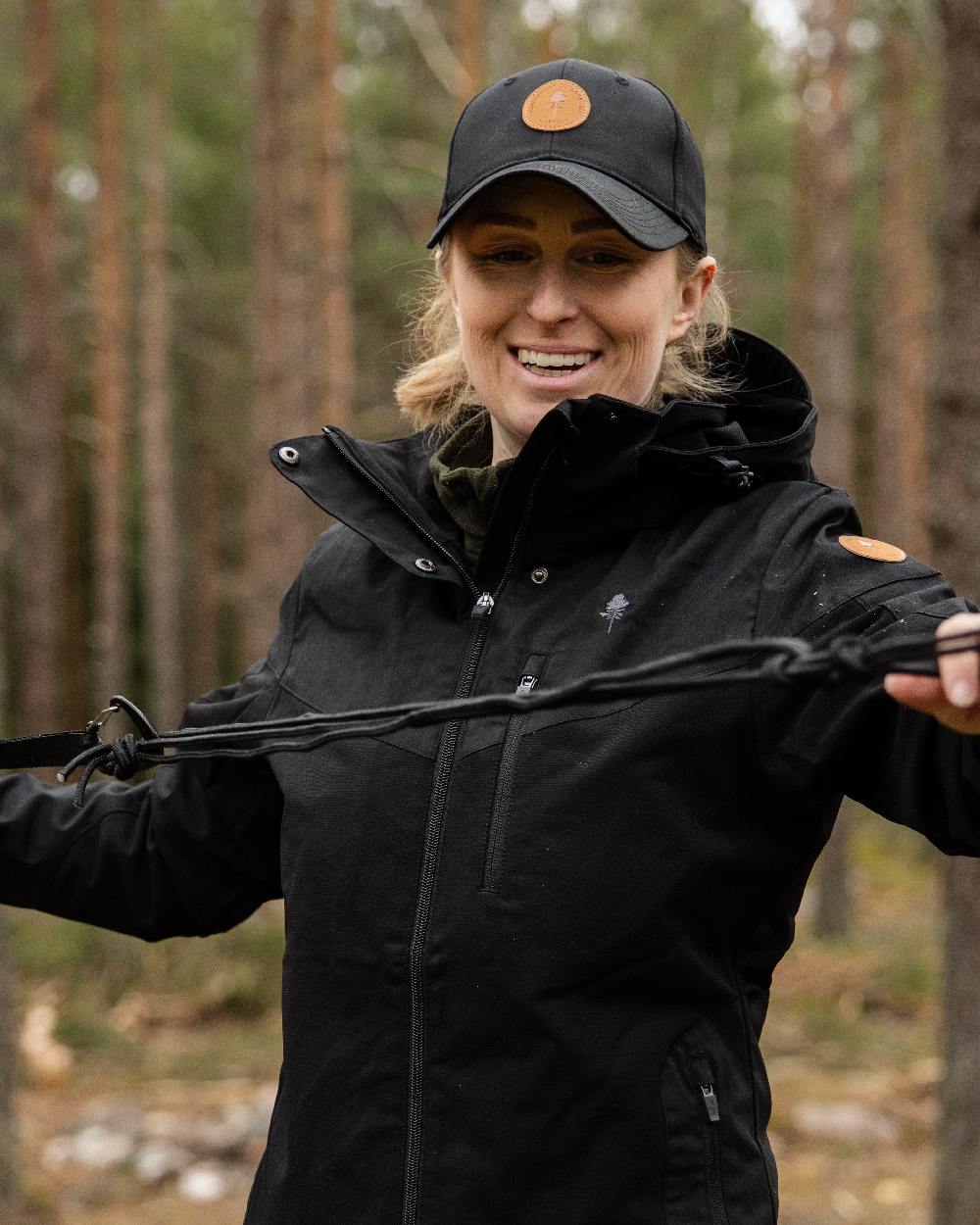 Black Coloured Pinewood Finnveden Hybrid Cap on outdoor background 