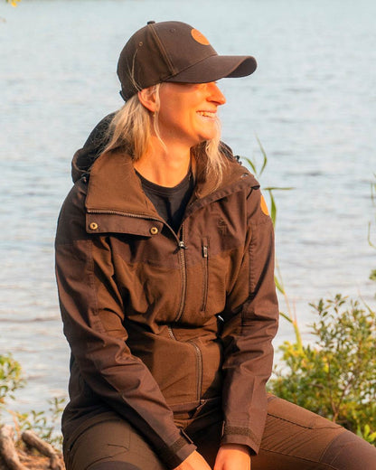 Dark Brown Coloured Pinewood Finnveden Hybrid Cap on outdoor background 