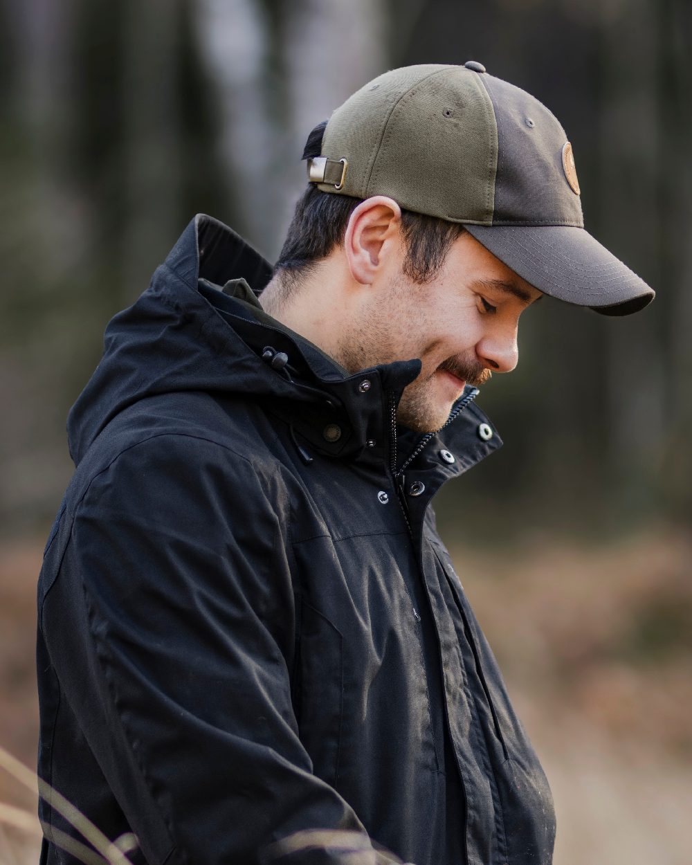 Dark Olive Hunting Olive Coloured Pinewood Finnveden Hybrid Cap on outdoor background 