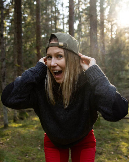 Dark Olive Hunting Olive Coloured Pinewood Finnveden Hybrid Cap on outdoor background 
