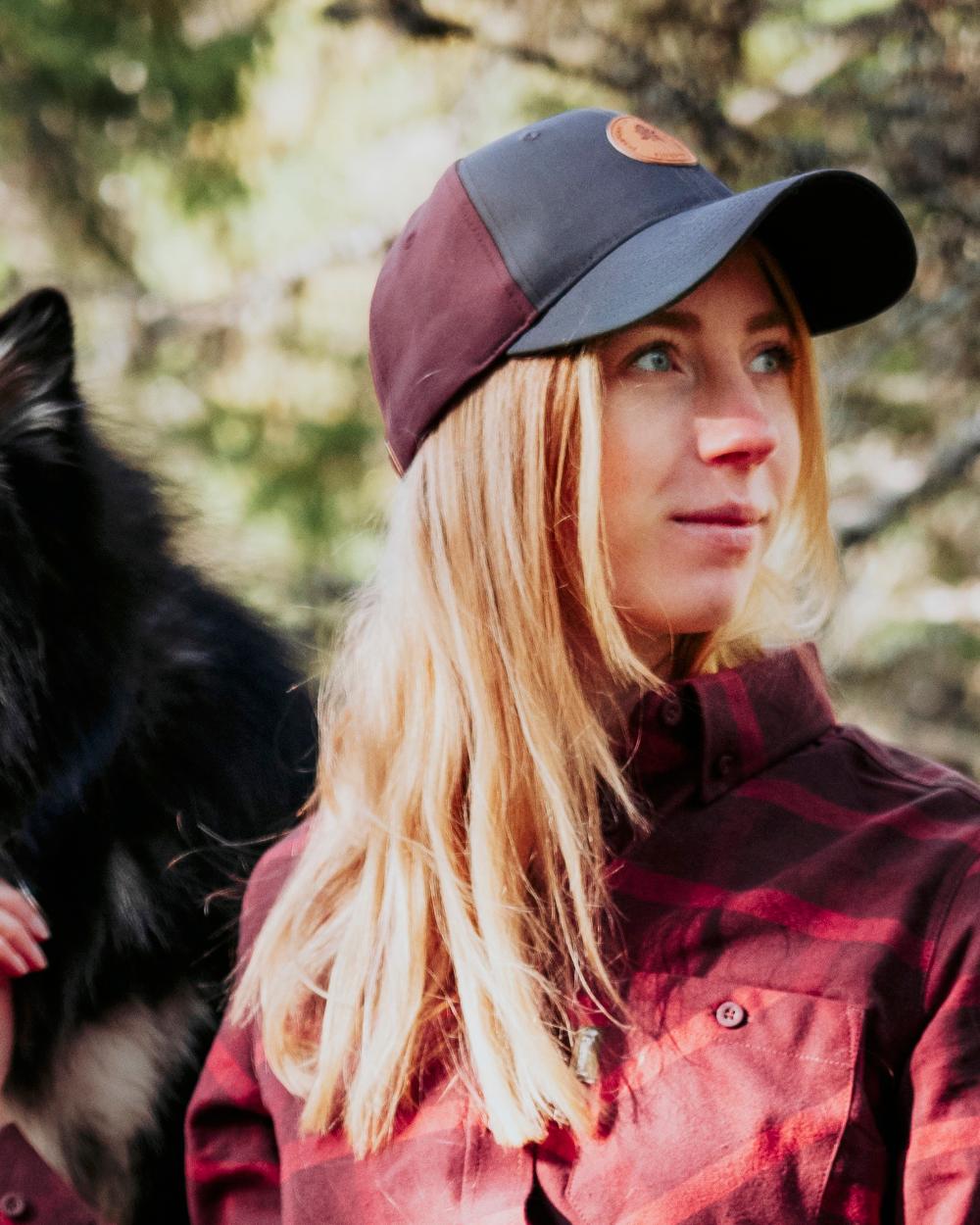 Earth Plum Dark Anthracite Coloured Pinewood Finnveden Hybrid Cap on outdoor background 