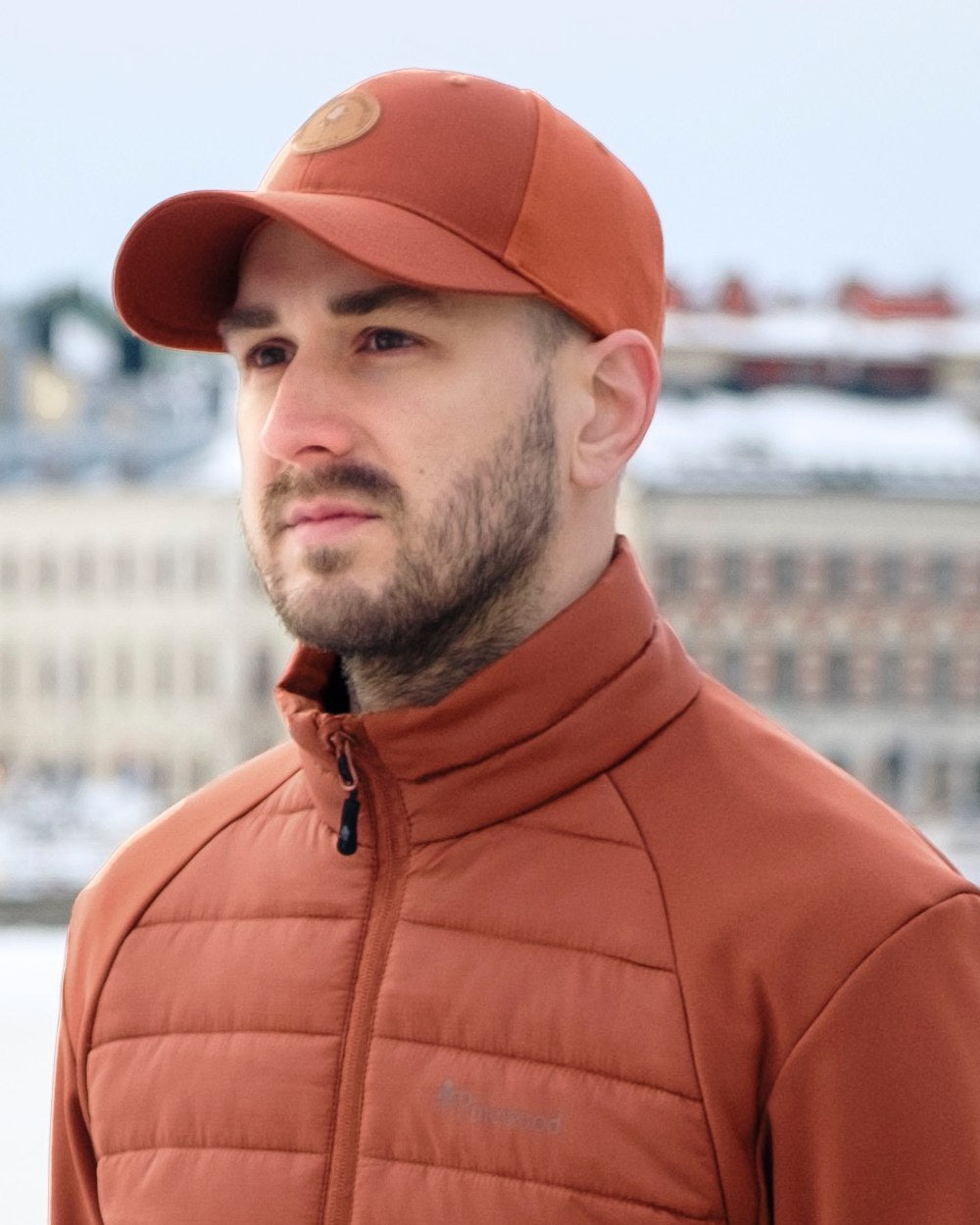 Terracotta Coloured Pinewood Finnveden Hybrid Cap on outdoor background 