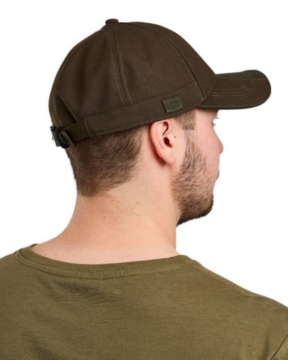 Suede Brown Mossgreen Coloured Pinewood Furudal Hunters Waterproof Cap on white background 