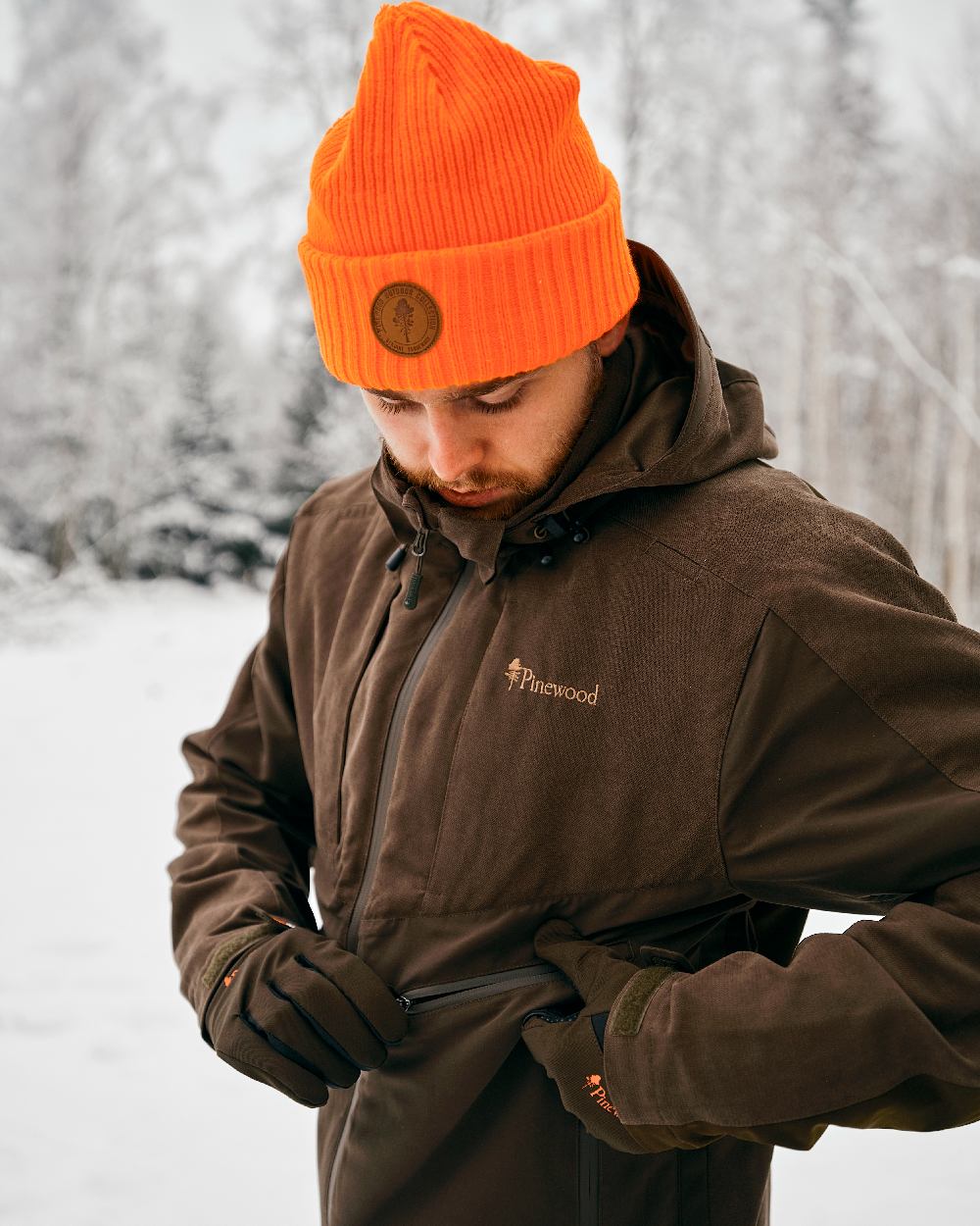 Moss Green Black Coloured Pinewood Hunters Neoprene Gloves on snow background 