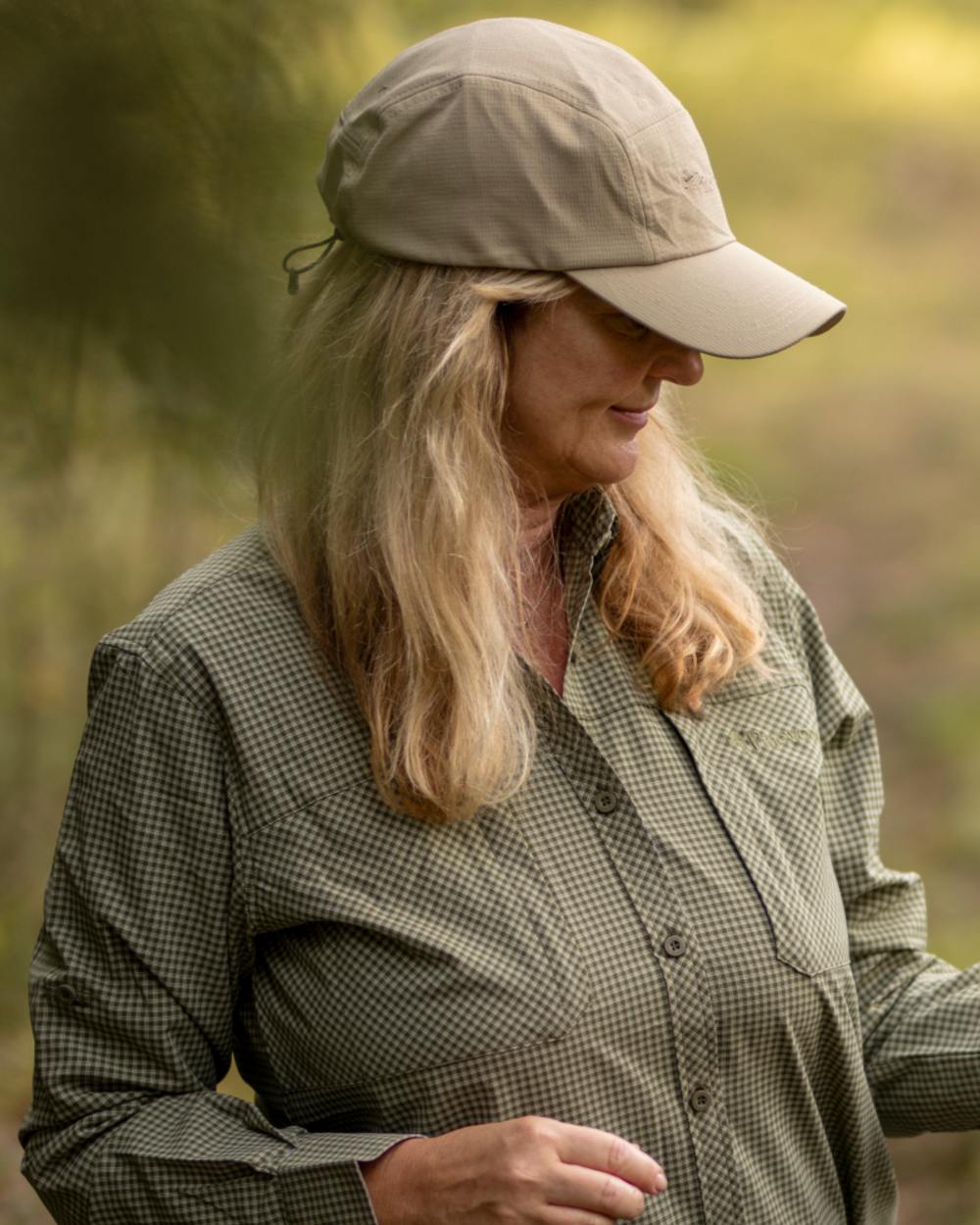 Light Khaki coloured Pinewood Insectsafe Cap on forest background 