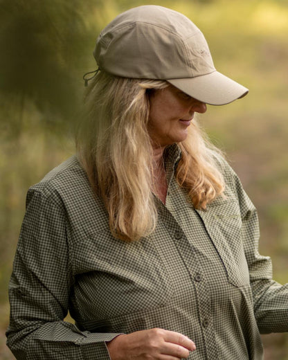 Light Khaki coloured Pinewood Insectsafe Cap on forest background 